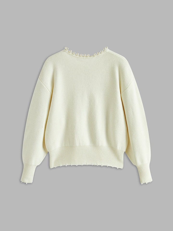 Celeste | Cardigan con bordo di perle
