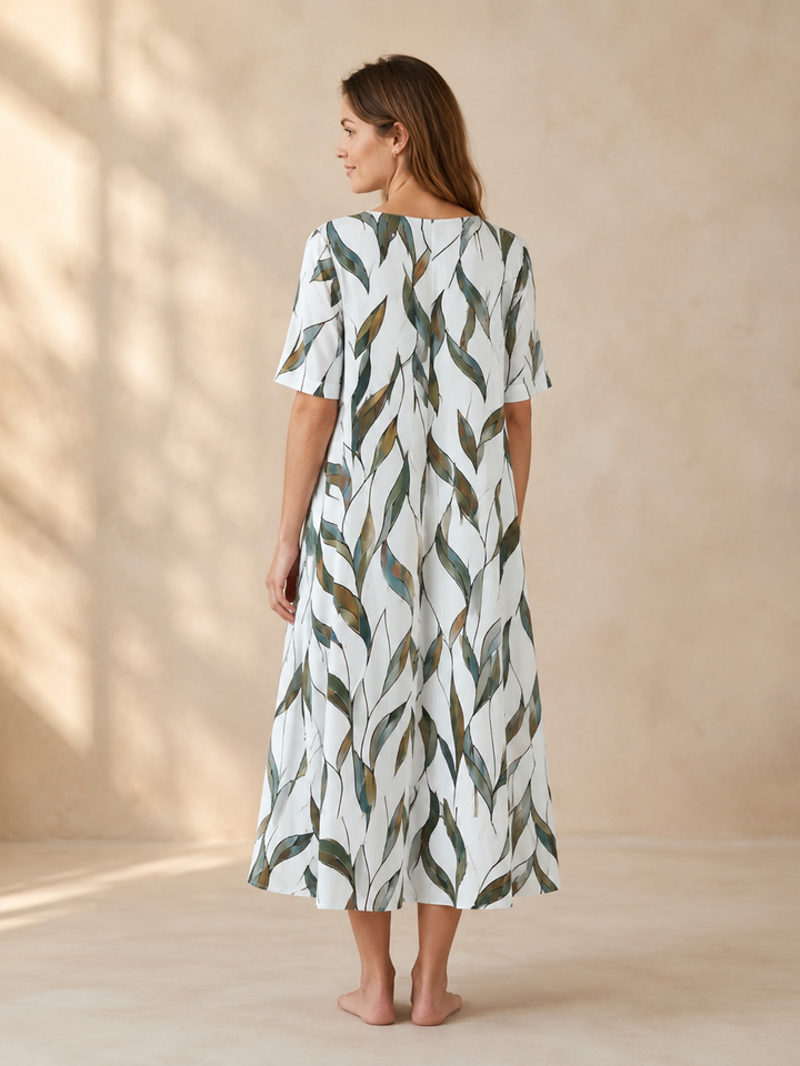 Marina | Kukkaprinttinen laskeutuva midimekko