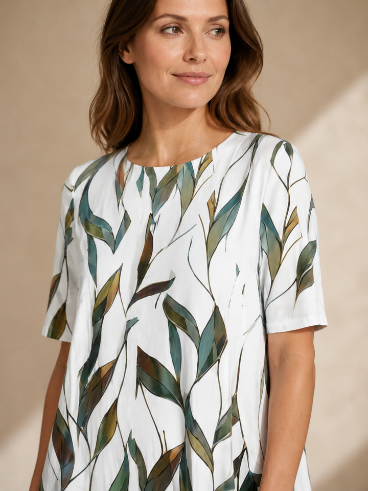 Marina | Kukkaprinttinen laskeutuva midimekko