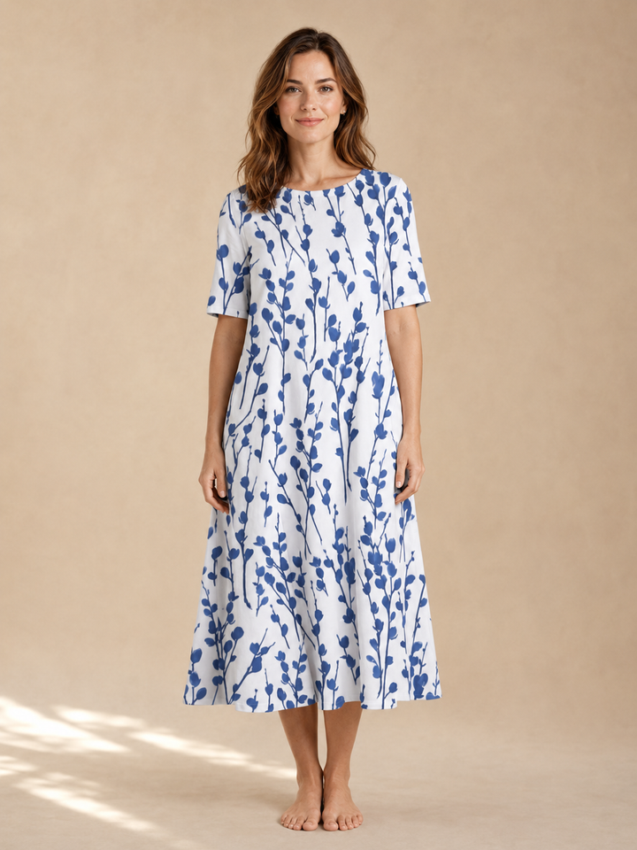 Marina | Kukkaprinttinen laskeutuva midimekko