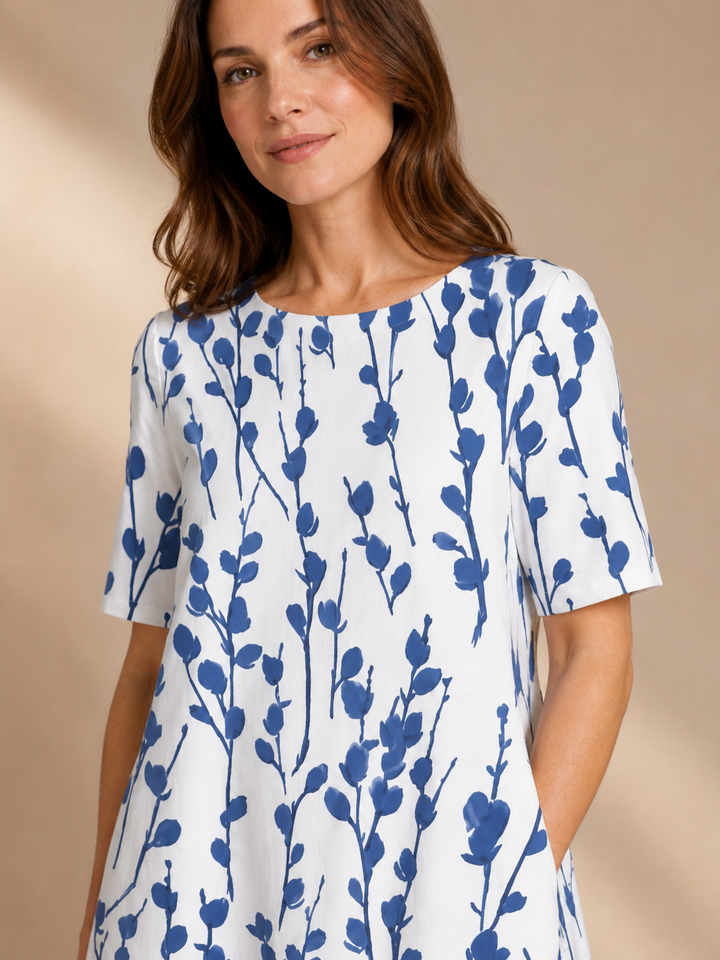 Marina | Kukkaprinttinen laskeutuva midimekko