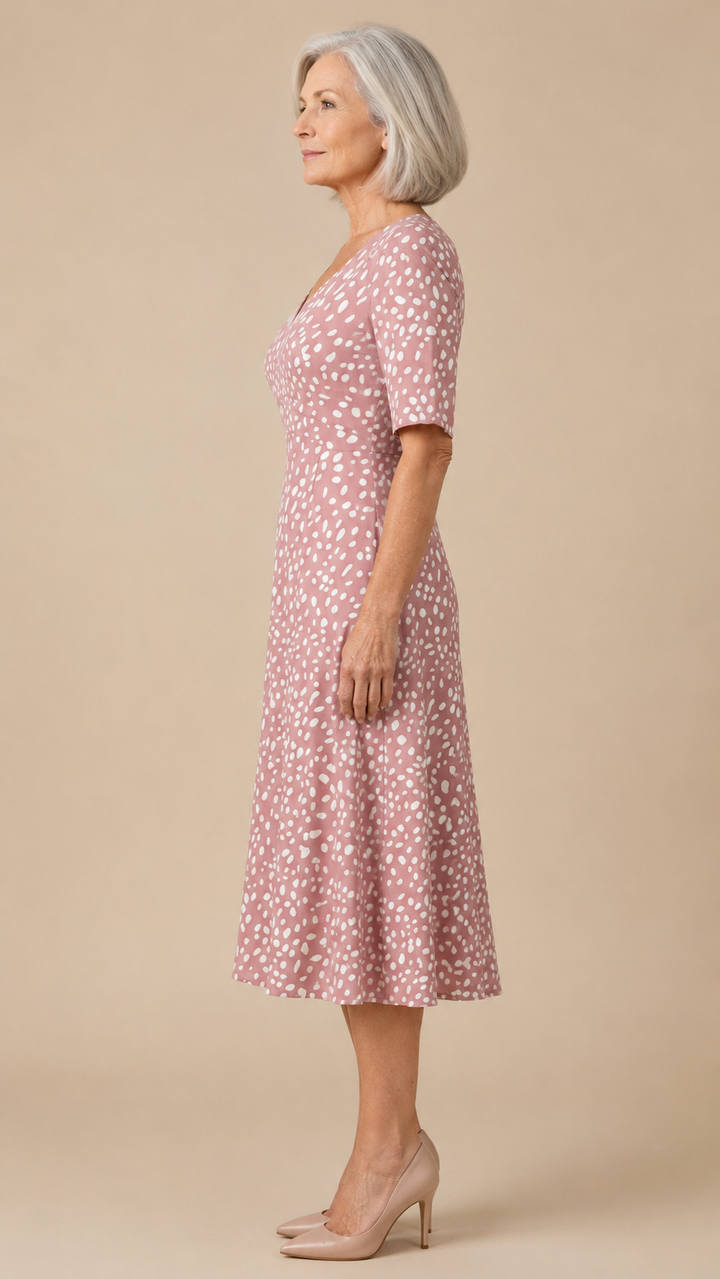 Colette | Polka-dot-kuvioinen, muotoileva midimekko juoksevalla leikkauksella