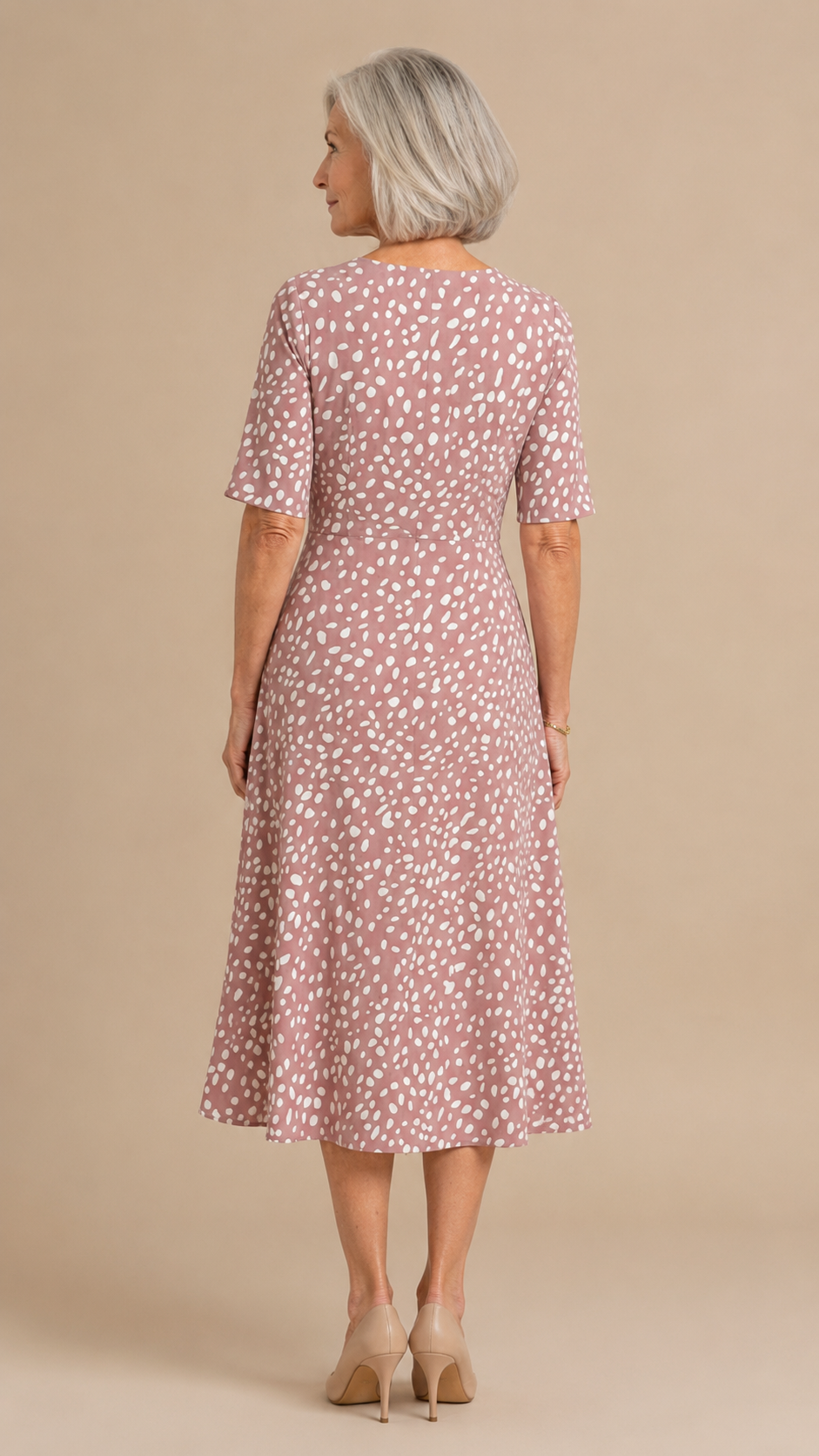 Colette | Polka-dot-kuvioinen, muotoileva midimekko juoksevalla leikkauksella