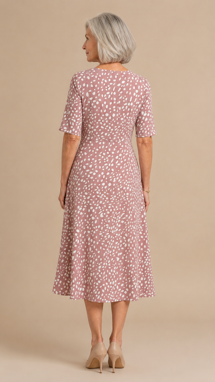 Colette | Polka-dot-kuvioinen, muotoileva midimekko juoksevalla leikkauksella