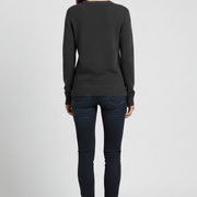 Women’s knitted sweater with round neckline and ribbed hem
