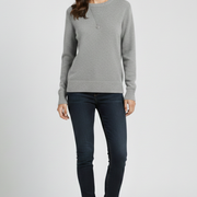 Women’s knitted sweater with round neckline and ribbed hem