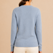 Women’s knitted sweater with round neckline and ribbed hem