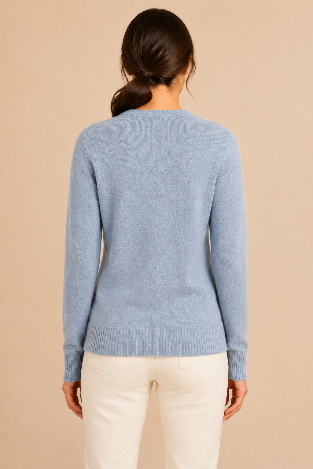 Women’s knitted sweater with round neckline and ribbed hem