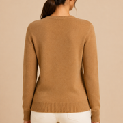 Women’s knitted sweater with round neckline and ribbed hem
