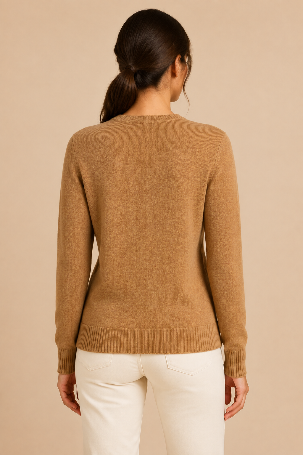 Women’s knitted sweater with round neckline and ribbed hem