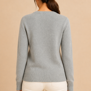 Women’s knitted sweater with round neckline and ribbed hem