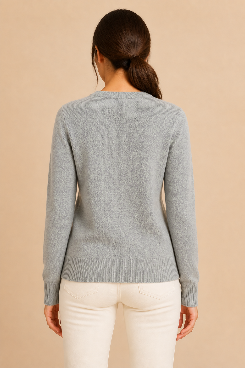 Women’s knitted sweater with round neckline and ribbed hem