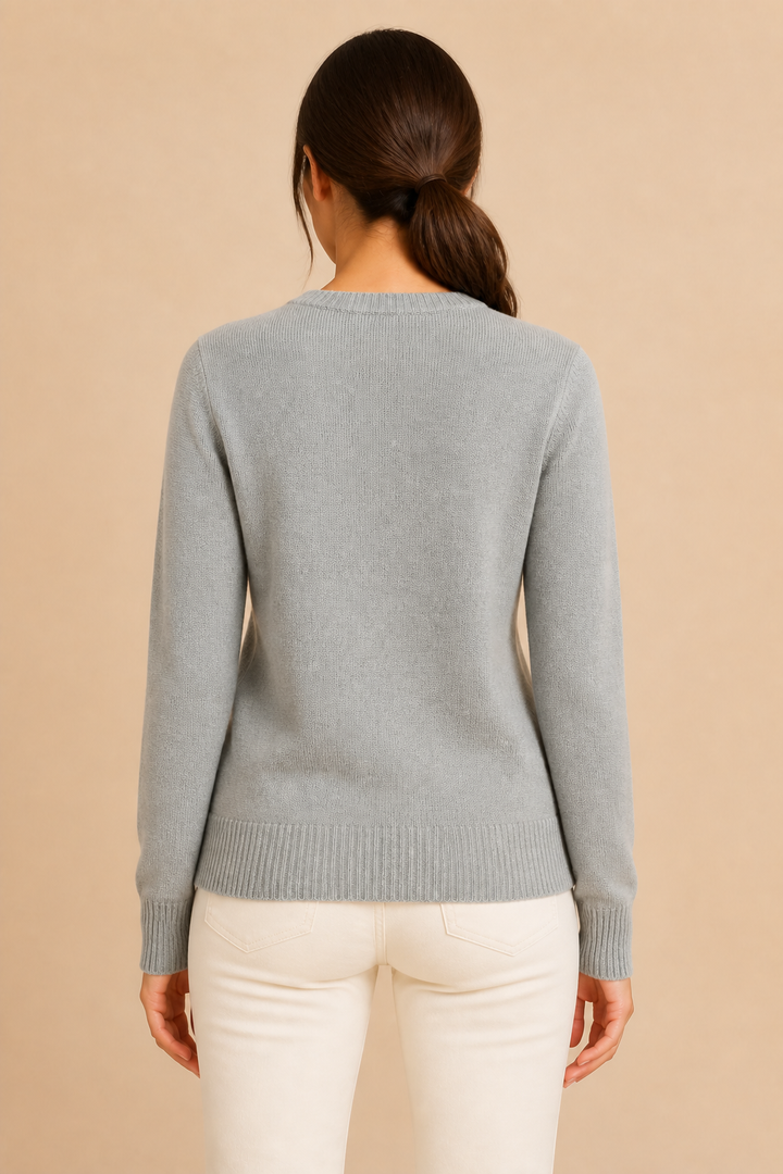 Women’s knitted sweater with round neckline and ribbed hem