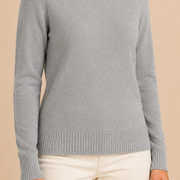 Women’s knitted sweater with round neckline and ribbed hem