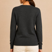 Women’s knitted sweater with round neckline and ribbed hem