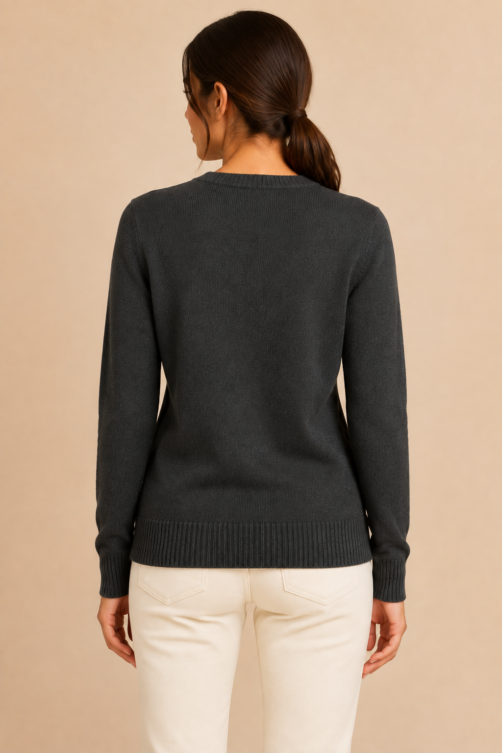 Women’s knitted sweater with round neckline and ribbed hem